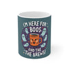 a uniquely designed ceramic mug with a halloween themed mug, it's a ceramic mug and it has spooky quote written on the mug, the mug has interesting design elements to it